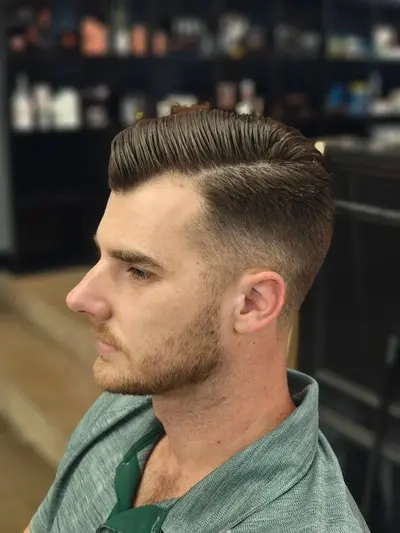 Client enjoying a stylish haircut at Richmond Barbershop