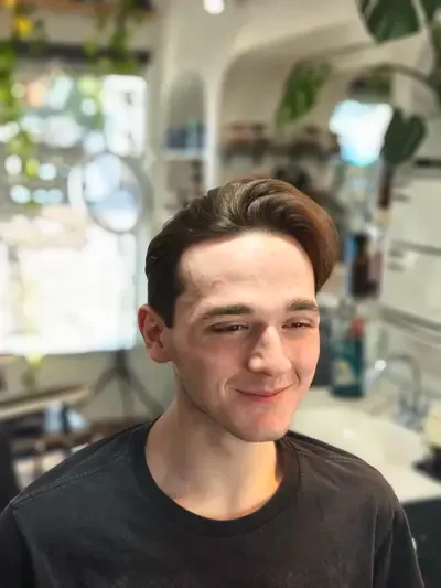 Toby getting a premium haircut at Richmond Barbershop