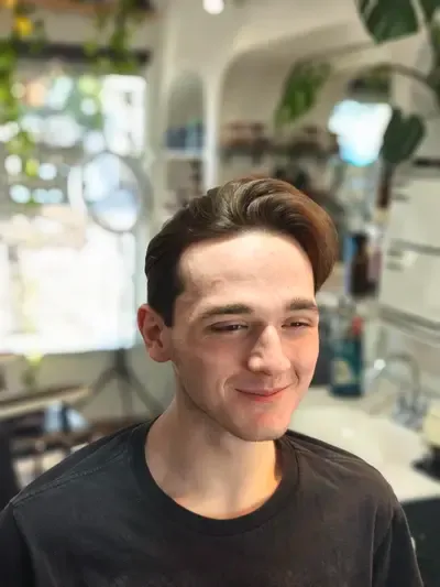 Toby getting a premium haircut at Richmond Barbershop